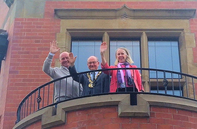 Mayor Billy Sheerin and MP Liz McInnes wave from the Carnegie Building