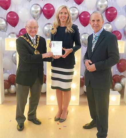 Mayor Billy Sheering and Councillor Kieran Heakin at Kentmere Academy presenting Headteacher, Mrs Sarah Isberg with the Pearson Silver Teaching Award trophy 