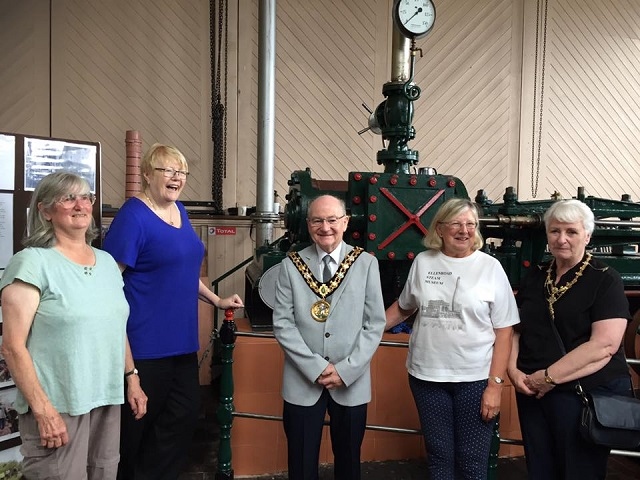 Mayor and Mayoress Billy and Lynn Sheerin start 'Irene', a horizontal single cylinder type engine, with Ellenroad Engine House volunteers and Cllr Irene Davidson