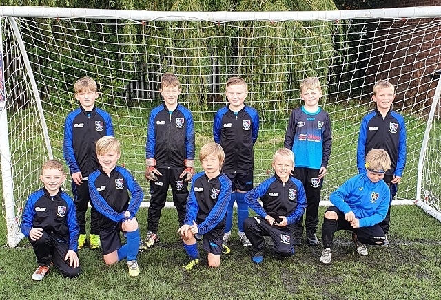 £6,300 was awarded to improve Whittles Park in Littleborough (pictured: a junior football team in Whittles Park)