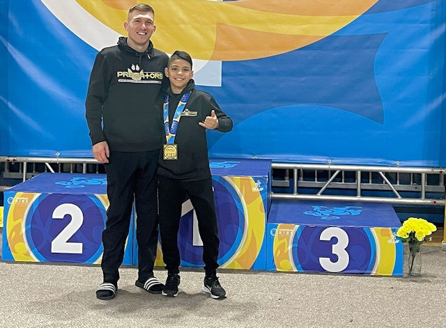 Andrew Perez and his coach, Ashley