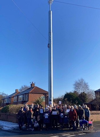 Local residents with the IX Wireless mast on Harbour Lane in Milnrow