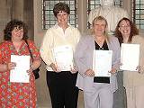 Carol, Sonia Rigley, Irene Whitehead and Jenny Mayor display their certificates of achievement