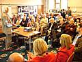 Geoff Tweedale speaks to a packed audience at Rochdale Town Hall