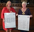 Pride of Rochdale initiative<br />Mayoress Beverley Place and Mayor Carol Wardle with the scroll signed local businesses and organisations