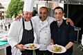 James Holden, Aazam Ahmad and audience participant Michael Cliffe show off the food they cooked at The Feel Good Festival
