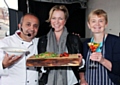 Aazam Ahmad, Rachel Allen and audience participant Jean Wyche show off the food they cooked in the Feel Good Festival celebrity food kitchen