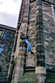 Naser Ali, Director of Pennine Solicitors, abseiling down the clock tower