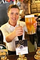 Sabrina White serves a pint of Golden Touch at The Flying Horse