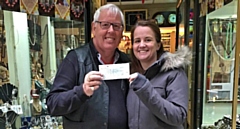 John Swinden presents a cheque to Gwen Tyler, from the Save Samantha Appeal