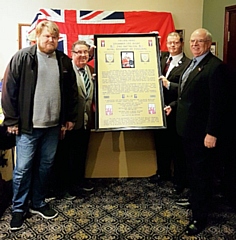 Memorial plaque about Fusilier Lee Rigby presented to Gavin Vitler, the founder of Rigby's Guardians Bike Club, by Councillor Ray Dutton, and the Heywood Veteran’s Association with Councillor Peter Rush