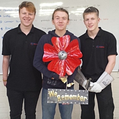 Connor Brumpton, Morgan Burke and Luke Dewhurst with their poppy creation
