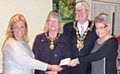 The Friends of Hopwood Park are presented with a cheque by the Mayor and Mayoress 
