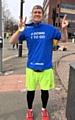Councillor Furlong shows off his hard-earned medal following the Manchester Marathon