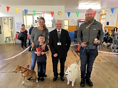 Councillor Billy Sheerin awards Best in Show to Prince and owner David Cockcroft and runner-up to Maggie with Tommy and Sarah Parkinson