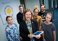 Julia Heap, the college’s principal and CEO (front) with students and staff at Hopwood Hall College’s Middleton campus.