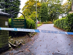 Police tape at Hare Hill Park the morning after the report