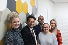 Councillor Ifikhar Ahmed, cabinet member for adult care (second left) congratulates Adi Dalman (second right) on her award success, with staff from PossAbilities