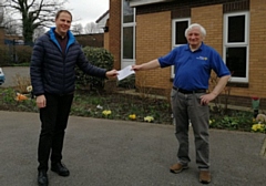 Rotary Heywood 2020 secretary, Edwin Partridge presenting a cheque to the St Margaret's Church warden, Stuart Russell