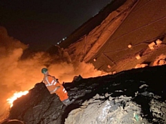 A section of household waste measuring 100m x 150m started burning