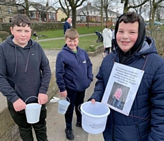 Ryan James Lambert (right) walked around the lake to raise money for the intensive care unit at Royal Blackburn Hospital which cared for his mum before she died (pictured with friends Brandon and Jayden)