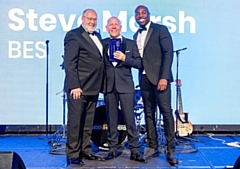 L-R Alan Gregory from Independent Air Quality Consultancy Services presenting the Outstanding Service award to Steve Marsh, executive chairman of BES and event host, comedian Darren Harriot