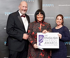 Tanfantastic Sunbeds won a prestigious award: Michael and Lorraine Livesey with Liane Cope