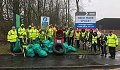 Stakehill Industrial Estate volunteers with the litter they have collected