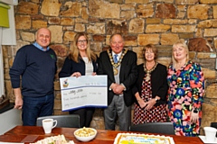 Chris Bell and Louise Scott of H Bells present their donation to Liz Dodd from Jolly Josh with the Mayor and Mayoress