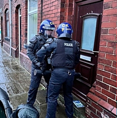 Officers forced entry to the property on Muriel Street, Rochdale