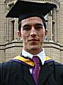 Brad Journeaux BSc(Hons), MA in his graduation gown