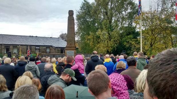 Crowds pack the Square for Littleborough's Remembrance Service.