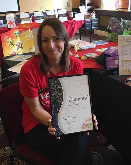 Lisa Elsworth with her Diamond Consultant award