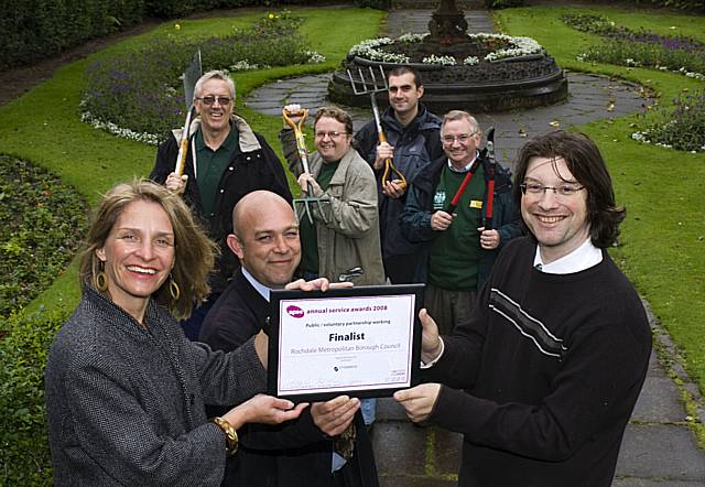 CROP SQUAD: (Front row L-R) Councillor Wera Hobhouse, Andrew Whitehead and Ian Trickett stand proudly with the Green Volunteers’ APSE finalist certificate, with (back row L-R) fellow Green Volunteers John Fleming, Jonathon Kershaw, Taras Melnyk and Frank Harrison.