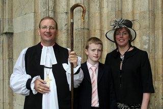 The Rt Rev Mark Davies with his wife Joanne and son Tim