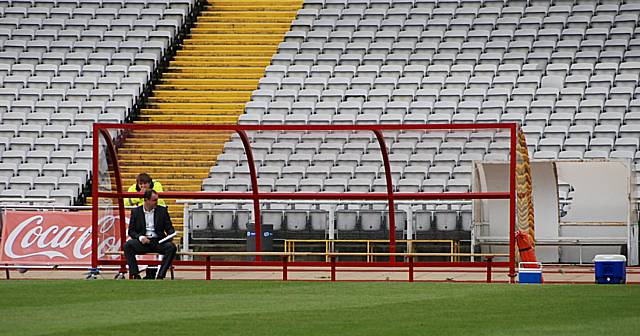 The dugout was a lonely place for Keith Hill after Rotherham's stoppage time equaliser.