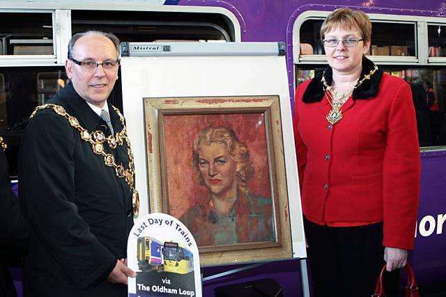 Rochdale Mayor & Mayoress Keith Swift and Sue Etchells with a painting of Gracie Fields