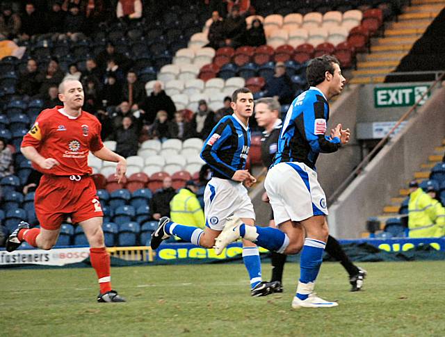 Le Fondre wheels away after scoring from the spot.