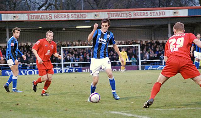 Buckley attacks the Accrington defence once more.
