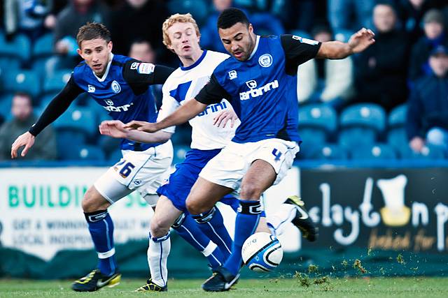 Rochdale 1 - 1 Oldham<br />Marcus Holness wins the ball
