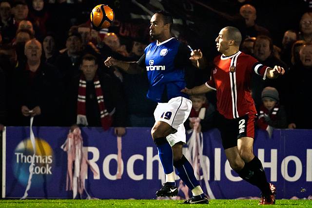 Rochdale v FC United of Manchester - Chris O'Grady chased by Kyle Jacobs
