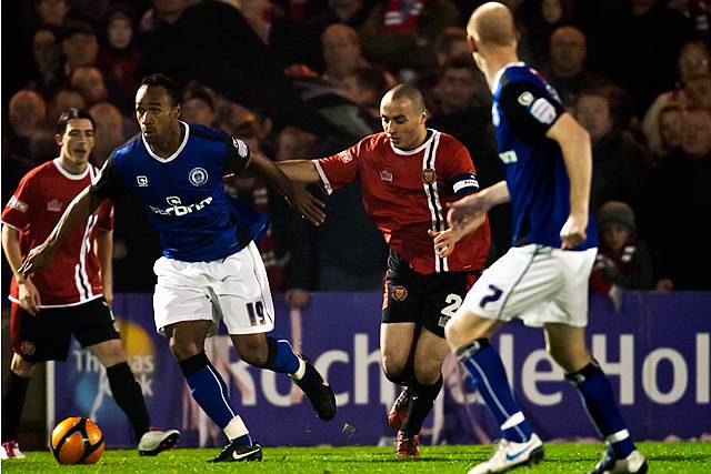 Rochdale v FC United of Manchester - Chris O'Grady gets the better of Kyle Jacobs