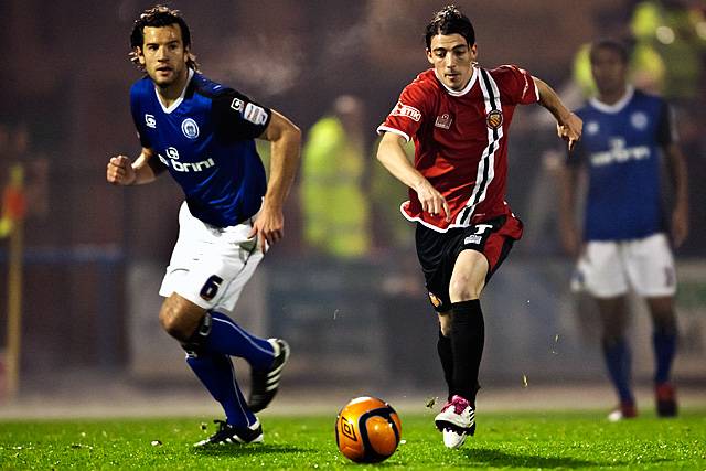 Rochdale v FC United of Manchester - Carlos Roca pursued by Brian Barry-Murphy