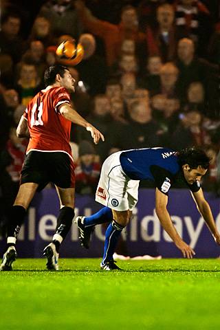 Rochdale v FC United of Manchester - Ben Deegan heads but only after a push in Brian Barry-Murphy's back
