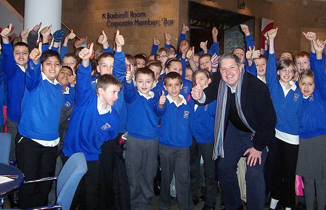 Children from St Andrew’s CE with Councillor Dale Mulgrew at the Bridgewater Hall 
