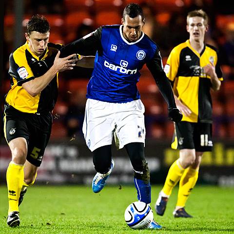 Rochdale 3 - 1 Bristol Rovers<br />Liam Dickinson tussles with Danny Coles