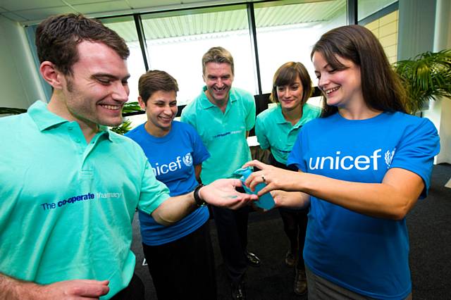 Pharmacist Padraig McGuinness; Jane Kellas of UNICEF; Co-operative Pharmacy Managing Director John Nuttall; Co-operative International Development Adviser Hannah Newcomb; Lydia Piddock, UNICEF