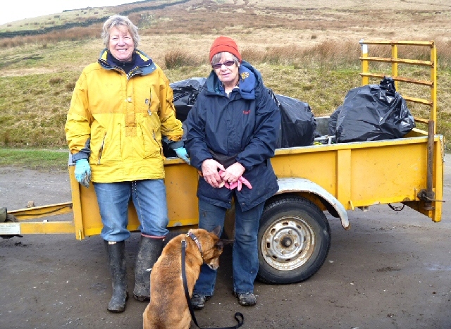 Councillor Ann Metcalfe (left) and local volunteer Val Johnston pictured in 2012 after collecting more than 21 sacks of rubbish from unofficial car parks near reservoirs in Norden