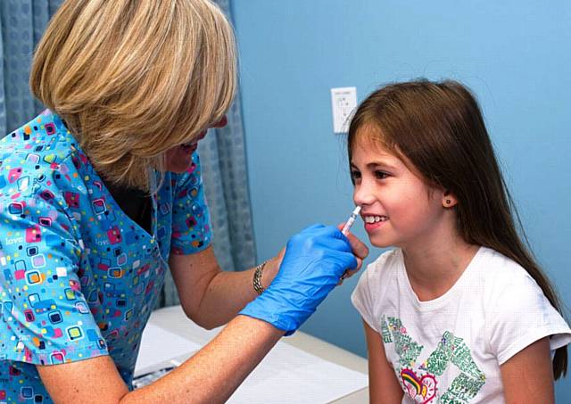 Young children are among the groups of people at particular risk from flu
