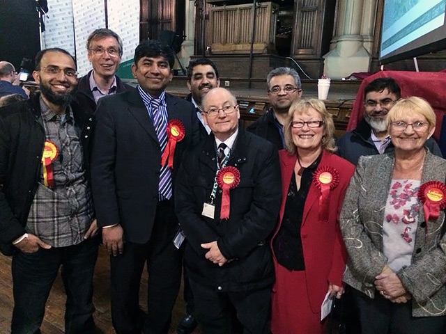 Castleton Labour Party members celebrating victory with newly elected councillor Aasim Rashid, Councillor Billy Shreein and Councillor Jean Hornby at Rochdale Town Hall 